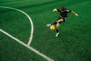 photo commerciale campagne soccer sports experts terrain de football